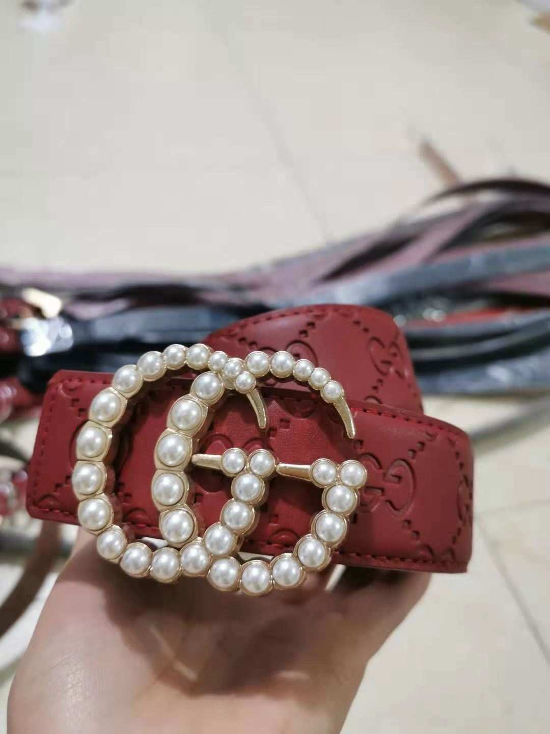GG leather Belt with pearls.